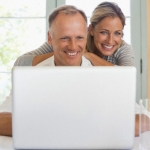 Couple at Home with Laptop